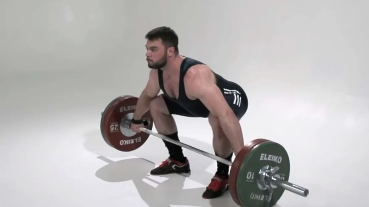 Lee más sobre el artículo Snatch colgado (Hang Snatch): instructivo paso a paso para realizarlo de forma correcta